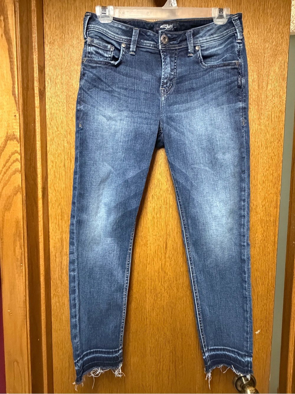 Silver Jeans Distressed Ankle Skinny in Medium Blue Wash
